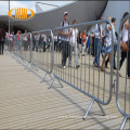 Fence outside concert crowd control barrier